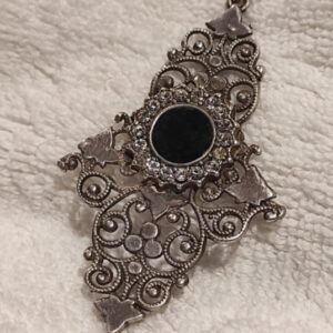 Demonic mirror pendant