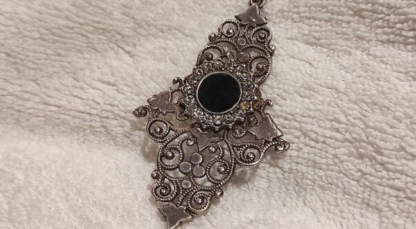 Demonic mirror pendant